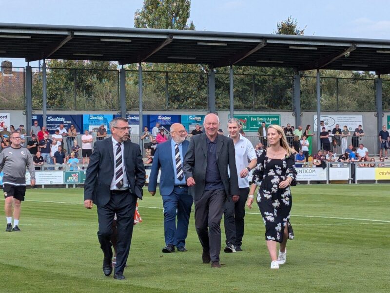 Jim with councillors on the pitch